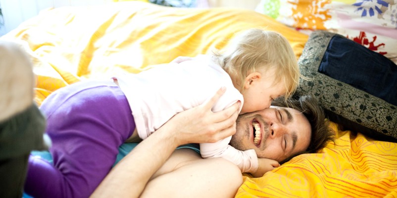 Dad playing with his young child