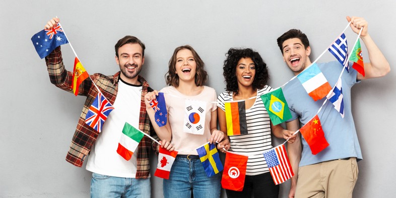 People of different nationalities holding flags